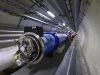 Technicians and engineers worked days and nights, carefully installing 20 magnets a week between 7 March 2005 and 26 April 2006. Each dipole weighs 34 tonnes and is 15 m long. Once they have been lowered down the specially constructed shaft, they begin a slow progression to their final destinations in the LHC tunnel, taking about 10 hours to arrive at the furthest point on the LHC ring.