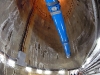 The last of 1746 superconducting magnets is lowered into the LHC tunnel via a specially constructed pit at 12:00 on 26 April. This 15-m long dipole magnet is one of 1232 dipoles positioned around the 27-km circumference of the collider. Dipole magnets produce a magnetic field that bends the particle beams around the circular accelerator.